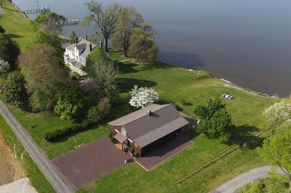 Aerial view of the manor house, reception barn, and Wicomico River