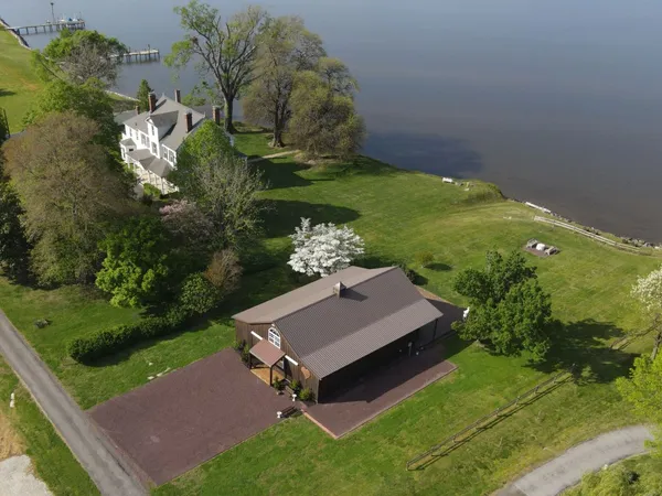 Aerial view of the manor house, reception barn, and Wicomico River